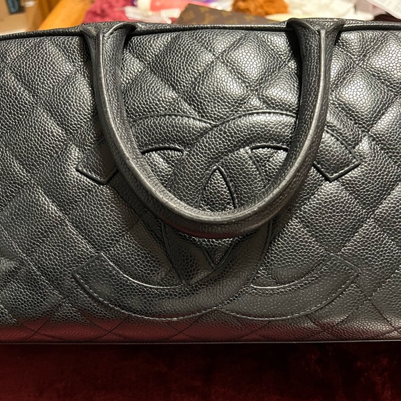 Preloved Chanel Caviar Leather bowling purse. Comes with COA and dust bag.
